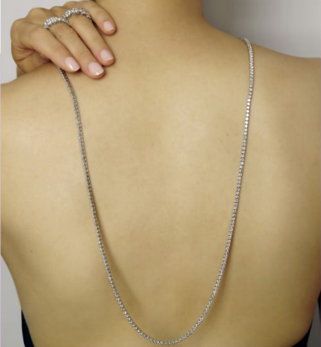 Diamond tennis necklace worn down the back