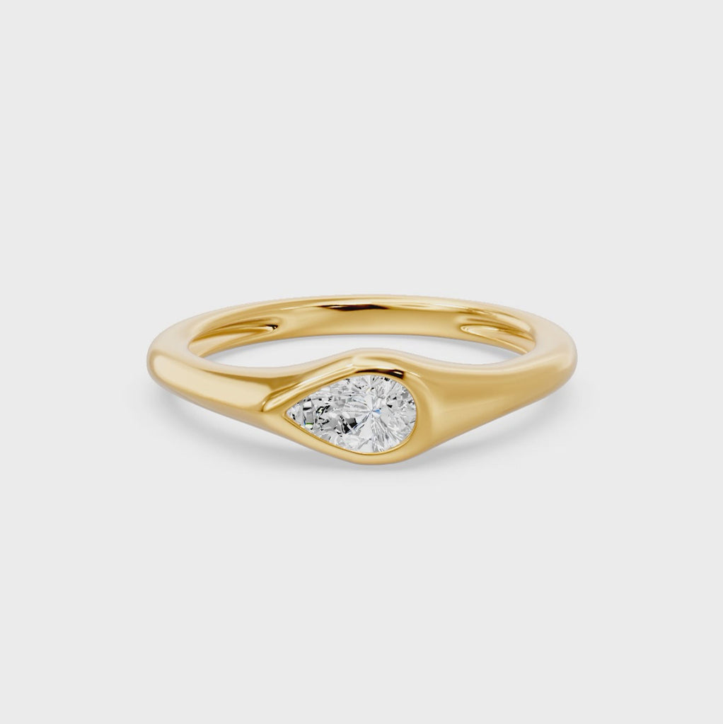 Bezel East West Pear Solitaire Ring, lab-grown diamonds, 14K yellow gold, video